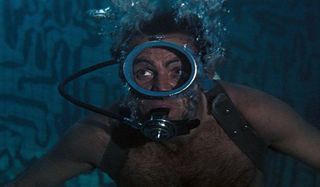 Sean Connery SCUBA diving as James Bond in Thunderball