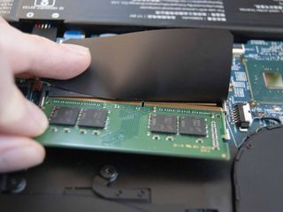 Insert the new RAM at a 45-degree angle