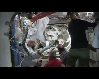 Both spacewalkers have re-entered the International Space Station following the cancellation of a spacewalk on July 16, 2013.