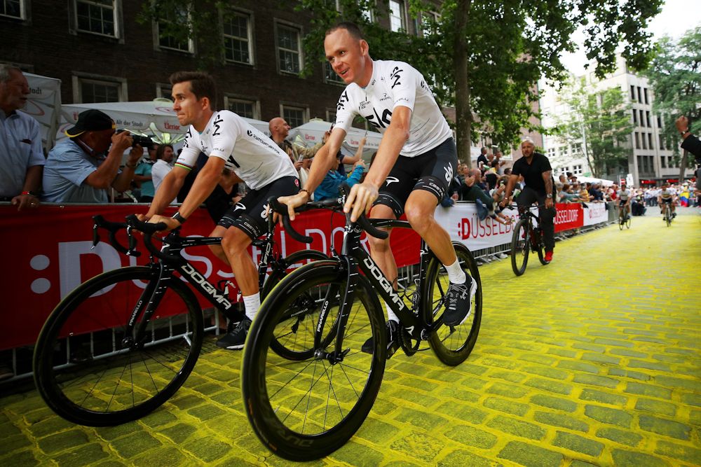 Chris Froome of Great Britain and Michal Kwiatkowski of Poland and Team Sky ride during the team presentation