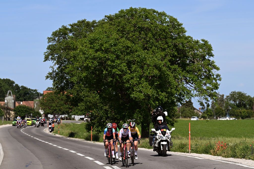 CHAMPAGNE SWITZERLAND JUNE 18 Demi Vollering of The Netherlands and Team SD WorxProtime Yellow Leader Jersey Neve Bradbury of Australia and Team CanyonSram Racing White Best Young Rider Jersey Katarzyna Niewiadoma of Poland and Team CanyonSram Racing and Elisa Longo Borghini of Italy and Team LidlTrek compete in the breakaway during the 4th Tour de Suisse Women 2024 Stage 4 a 1275km stage from Champagne to Champagne UCIWWT on June 18 2024 in Champagne Switzerland Photo by Tim de WaeleGetty Images