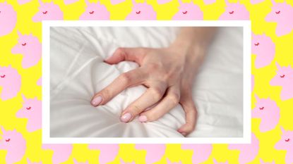 Close-up of sexy female hand pulling and squeezing white sheets in bed. Tender woman hand with sensual manicure. Sexy, pleasure and erotic concept