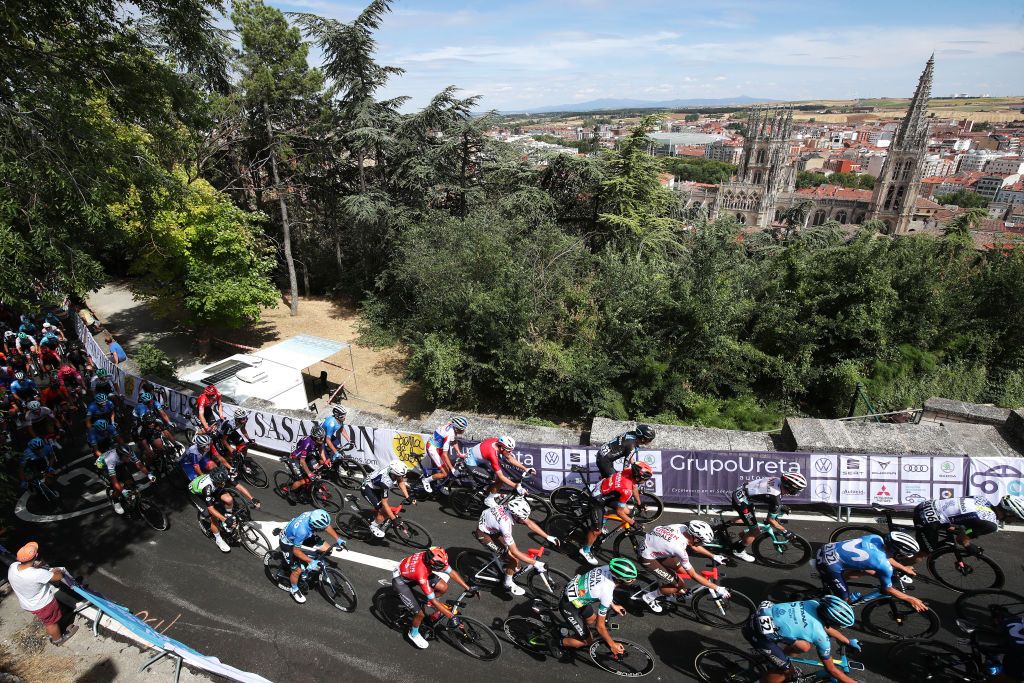 BURGOS SPAIN AUGUST 03 A general view of the peloton passinf the Alto del Castillo 980m in Burgos City during the 43rd Vuelta a Burgos 2021 Stage 1 a 161km stage from BurgosCatedral to BurgosAlto del Castillo 980m VueltaBurgos BurgosCycling CapitalMundialdelCiclismo catedral2021 on August 03 2021 in Burgos Spain Photo by Gonzalo Arroyo MorenoGetty Images