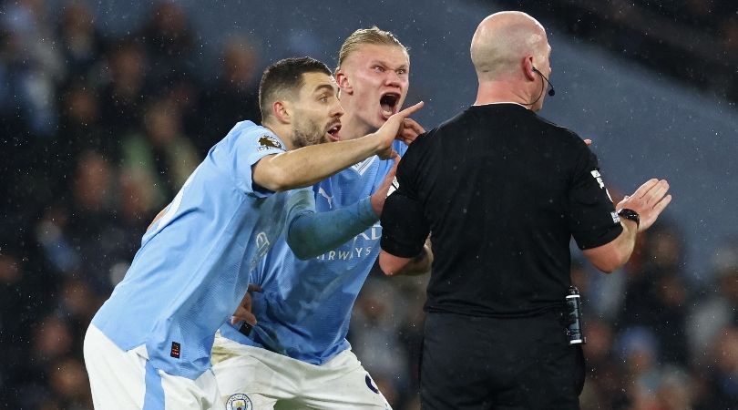 Erling Haaland and Ruben Dias complain to referee Simon Hooper after the official fails to play advantage late on in Manchester City&#039;s 3-3 draw against Tottenham with Jack Grealish through on goal.