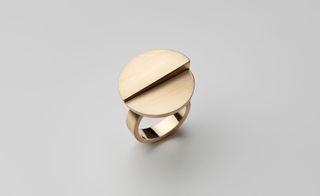 Golden ring with contemporary design