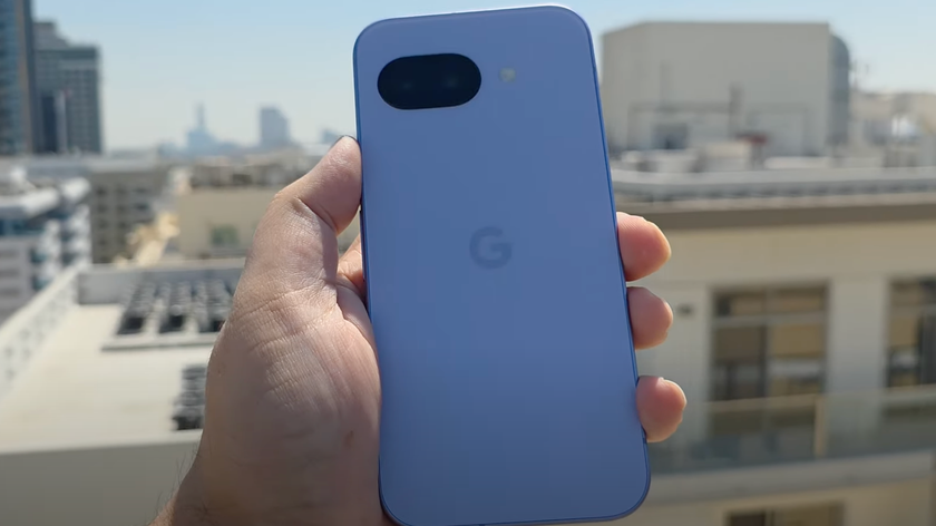 A YouTuber holding the leaked Pixel 9a