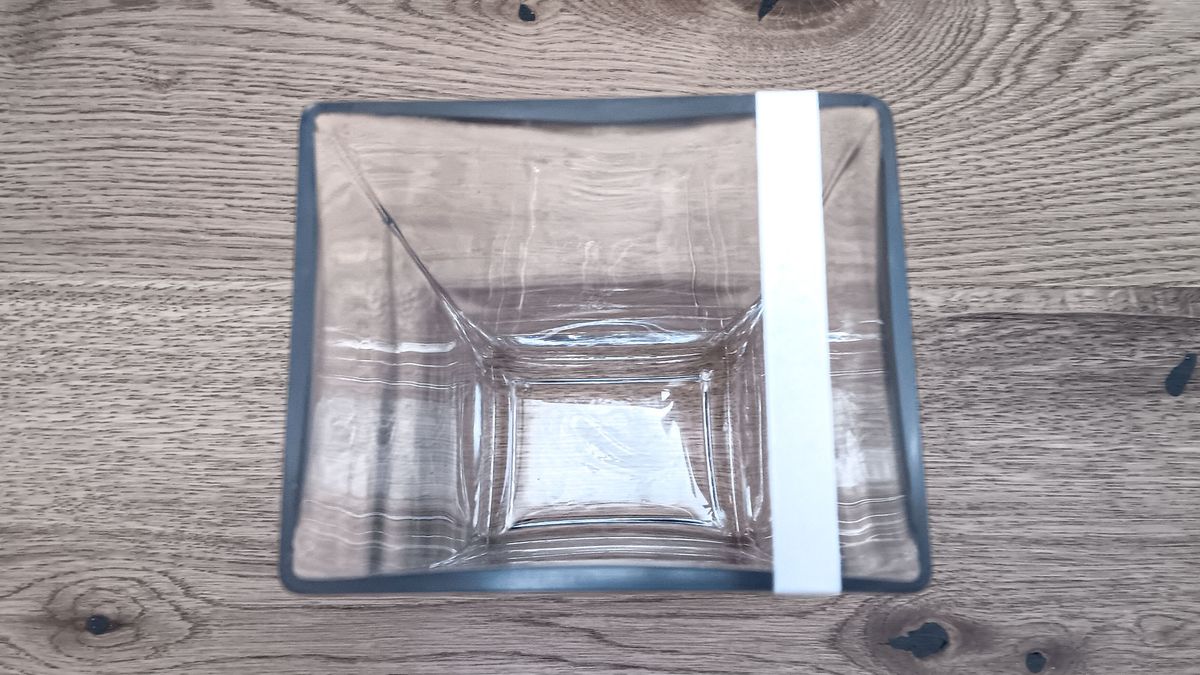 Glass flower vase with sticky tape to support an arrangement