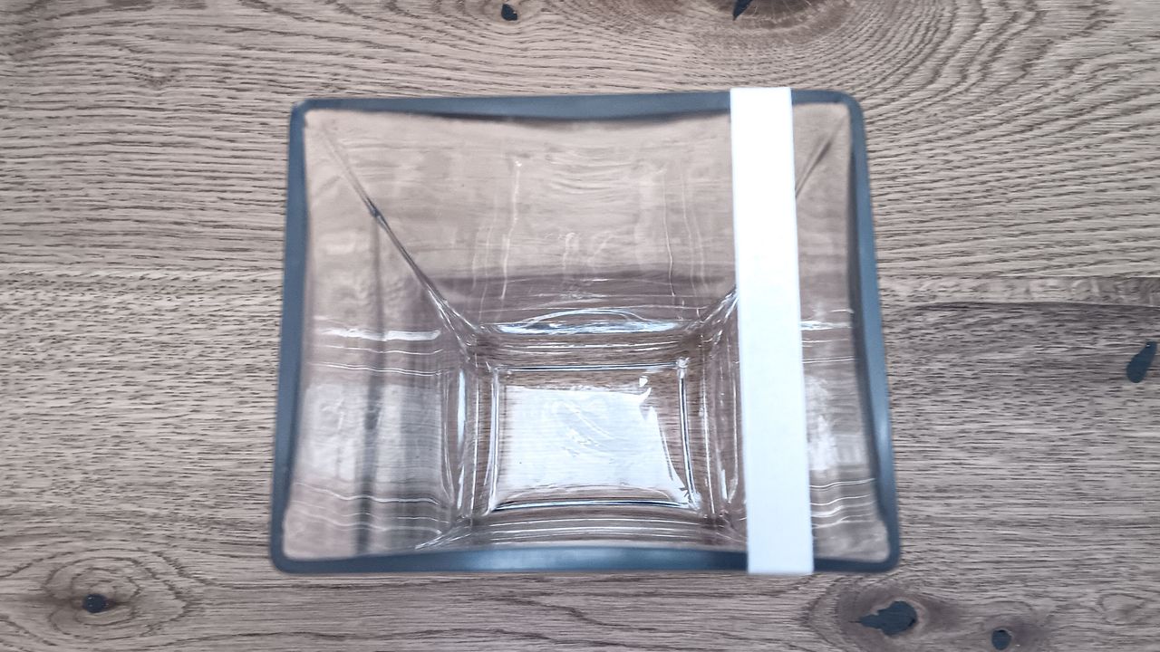 Glass flower vase with sticky tape to support an arrangement