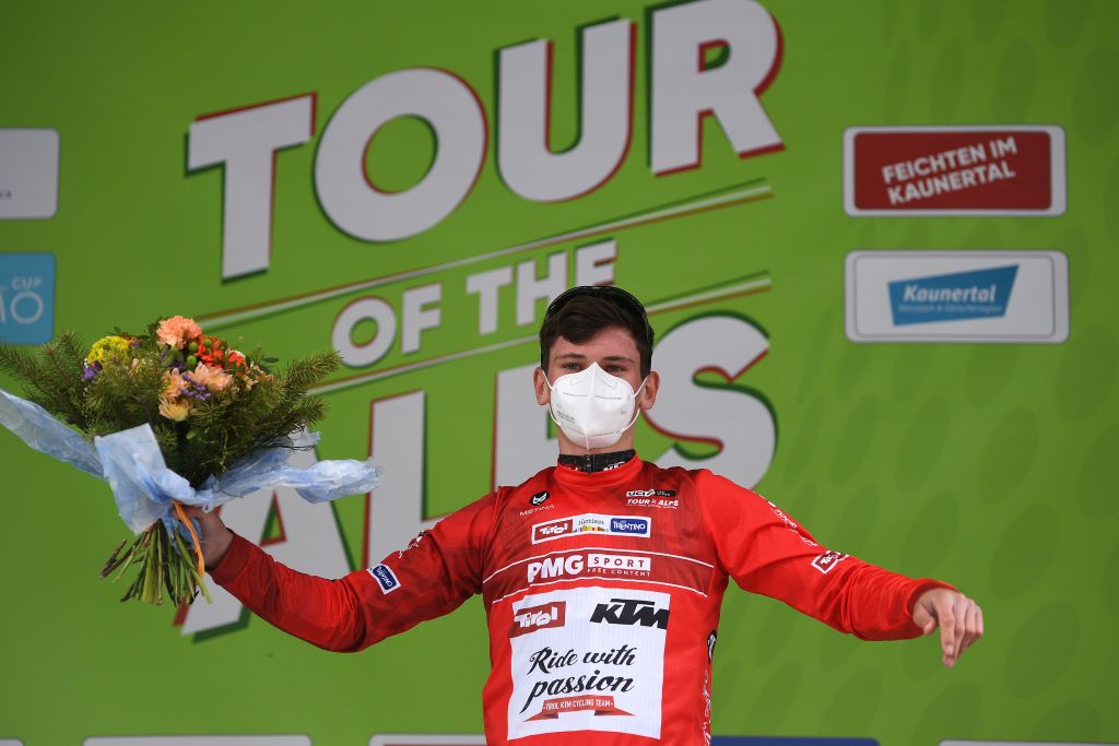 FEICHTEN IM KAUNERTAL AUSTRIA APRIL 20 Felix Engelhardt of Germany and Tirol KTM Cycling Team Red Sprint Jersey celebrates at podium during the 44th Tour of the Alps 2021 Stage 2 a 1215km stage from Innsbruck to Feichten im Kaunertal 1291m Mask Covid Safety Measures TourofTheAlps TouroftheAlps on April 20 2021 in Feichten im Kaunertal Austria Photo by Tim de WaeleGetty Images