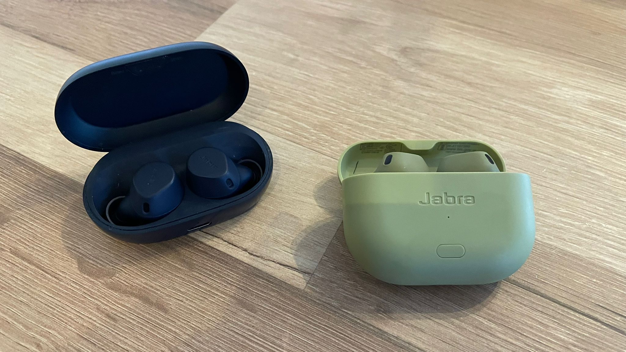 The Jabra Elite 8 Active Gen 2 earphones next to the Jabra Elite 7 Active earphones