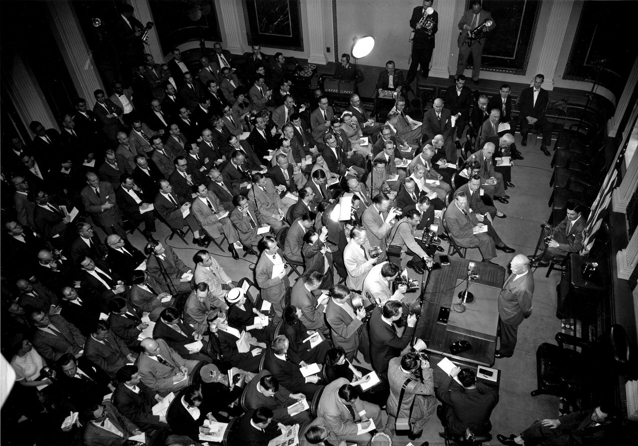 President Dwight D. Eisenhower faces reporters at a news conference on Feb. 25, 1953.