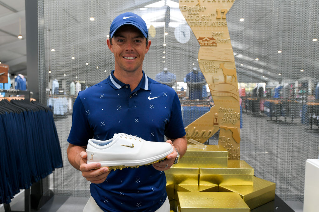 Rory McIlroy of Northern Ireland visited the Fan Shop to promote a PLAYERS Championship themed Nike shoe