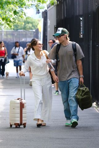 Millie Bobby Brown walks with her husband in New York wearing a white linen set