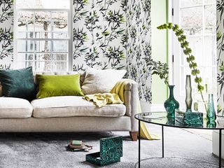 fresh green living room with floral wallpaper
