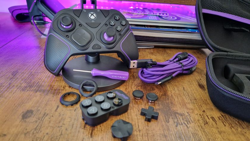 Victrix Pro BFG for Xbox on a wooden desk in front of purple lighting