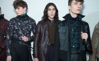 Male models wearing black, brown and patterned jackets from the Lanvin AW2015 collection