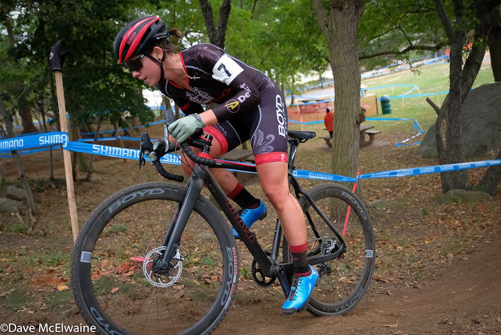 Allison Arensman (JA King) hammering out of the saddle on a small climb