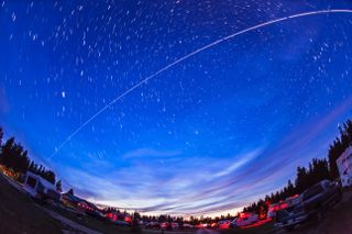 Trail of the International Space Station as it passes west to east over the Meadows Campground at Cypress Hills Interprovincial Park, Saskatchewan, Canada.