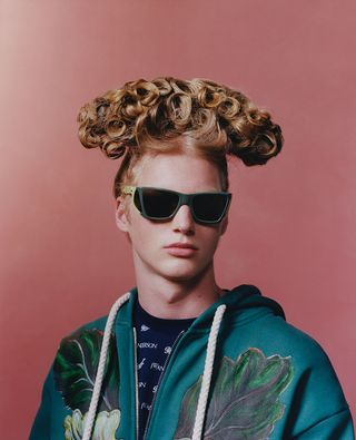 Male model wears JW Anderson x Persol 0009 sunglasses