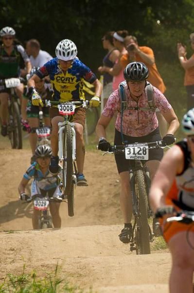 Cat 2 Sport racer Jen Clark catches air on the lead-out of the women's contest. Over 70 women competed at the Firecracker, not including the Citizen Juniors.