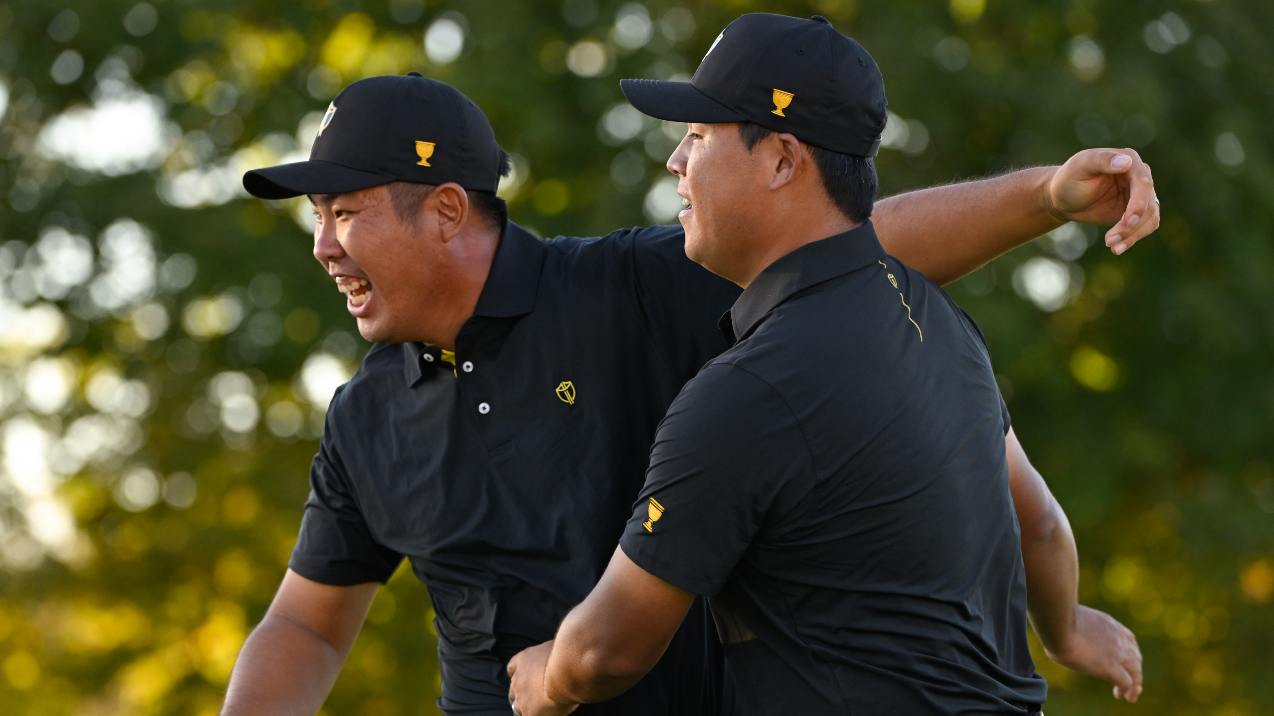 Si Woo Kim and Byeong Hun An during the Presidents Cup
