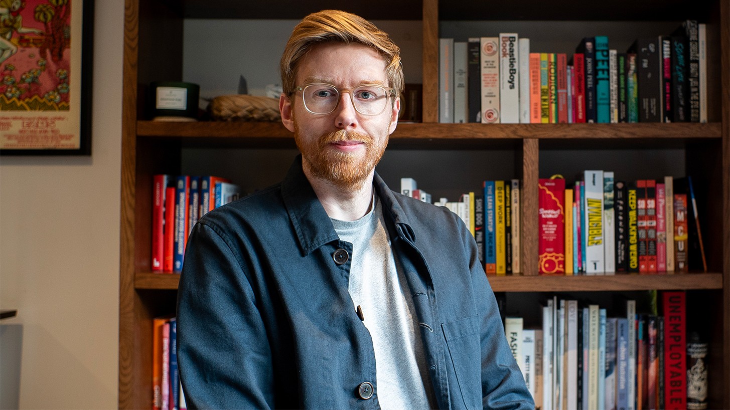 Portrait of Gordon Reid in front of bookcase