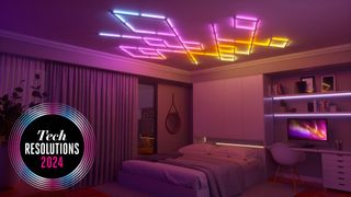The Nanoleaf Lines, brightly coloured lights, mounted on the ceiling of a bedroom, casting a pink and orange glow on the room