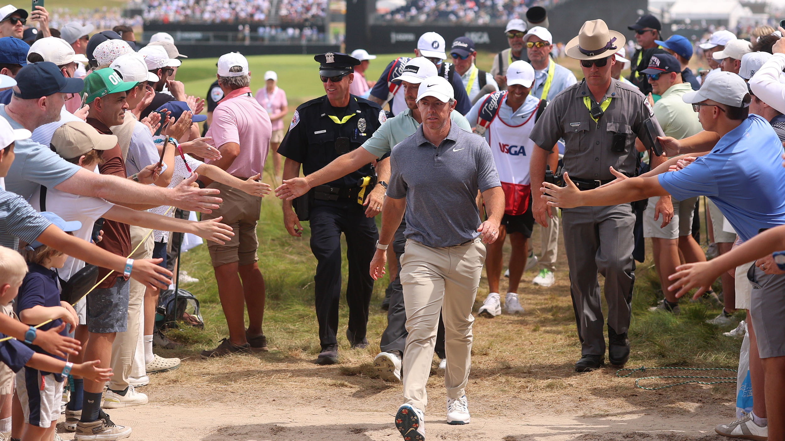 Rory McIlroy walks through the crowd at the 2026 US Open