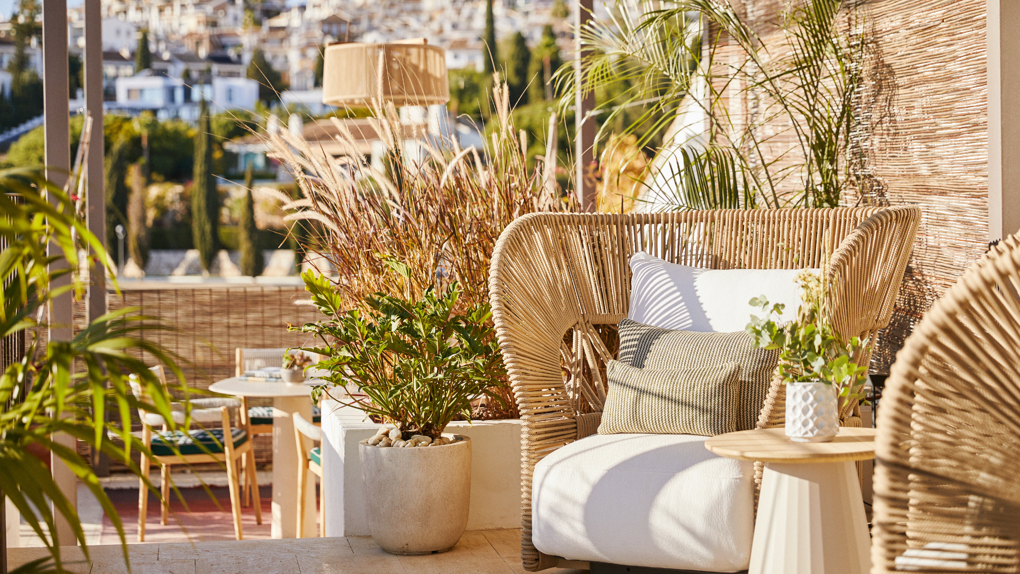 La Zambra outdoor area with wicker chairs.