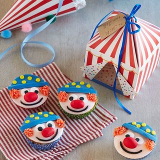 clown around with cupcakes on napkin