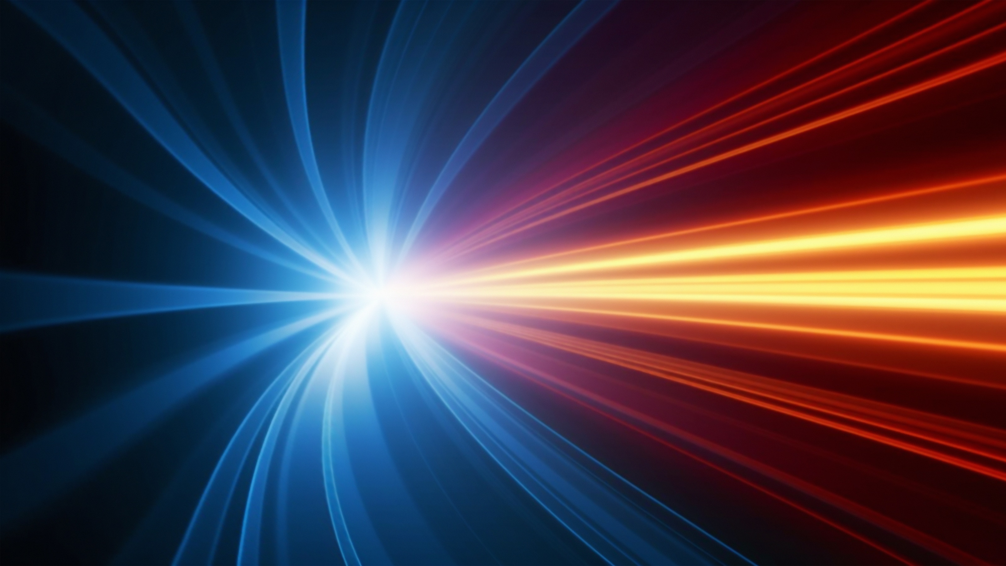 Abstract light trails that look like they're in a tunnel.