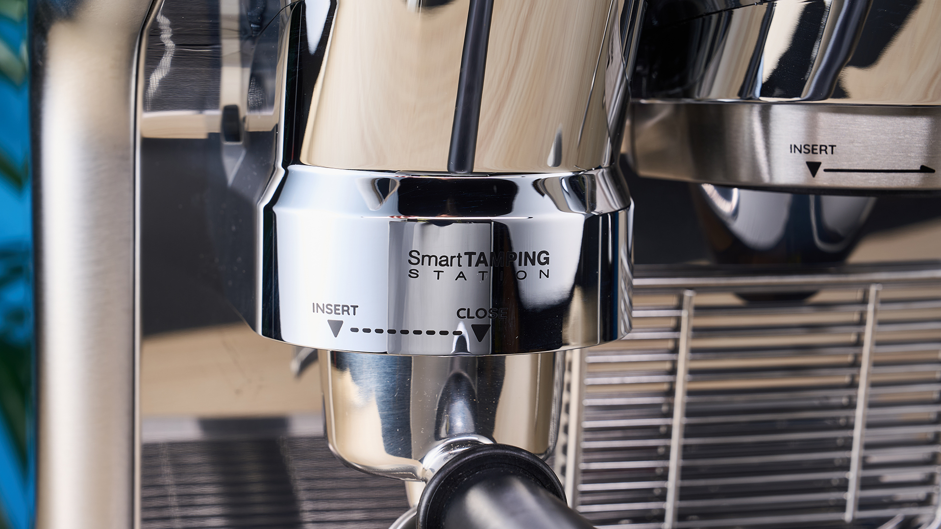 De'Longhi La Specialista Opera is a stainless steel manual espresso machine with smart tamping, a group handle, steam wand, and grinder
