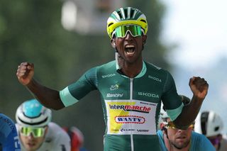 Intermarche - Wanty team's Eritrean rider Biniam Girmay wearing the sprinter's green jersey sprints past the finish line to win the 12th stage of the 111th edition of the Tour de France cycling race, 203,6 km between Aurillac and Villeneuve-sur-Lot, southwestern France, on July 11, 2024. (Photo by Thomas SAMSON / AFP)