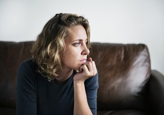 Sex Addict: a woman stares into the distance