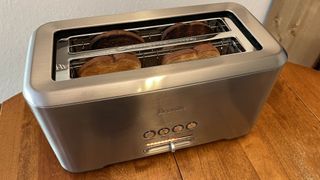 Breville Bit More 4-Slice Toaster on a kitchen table
