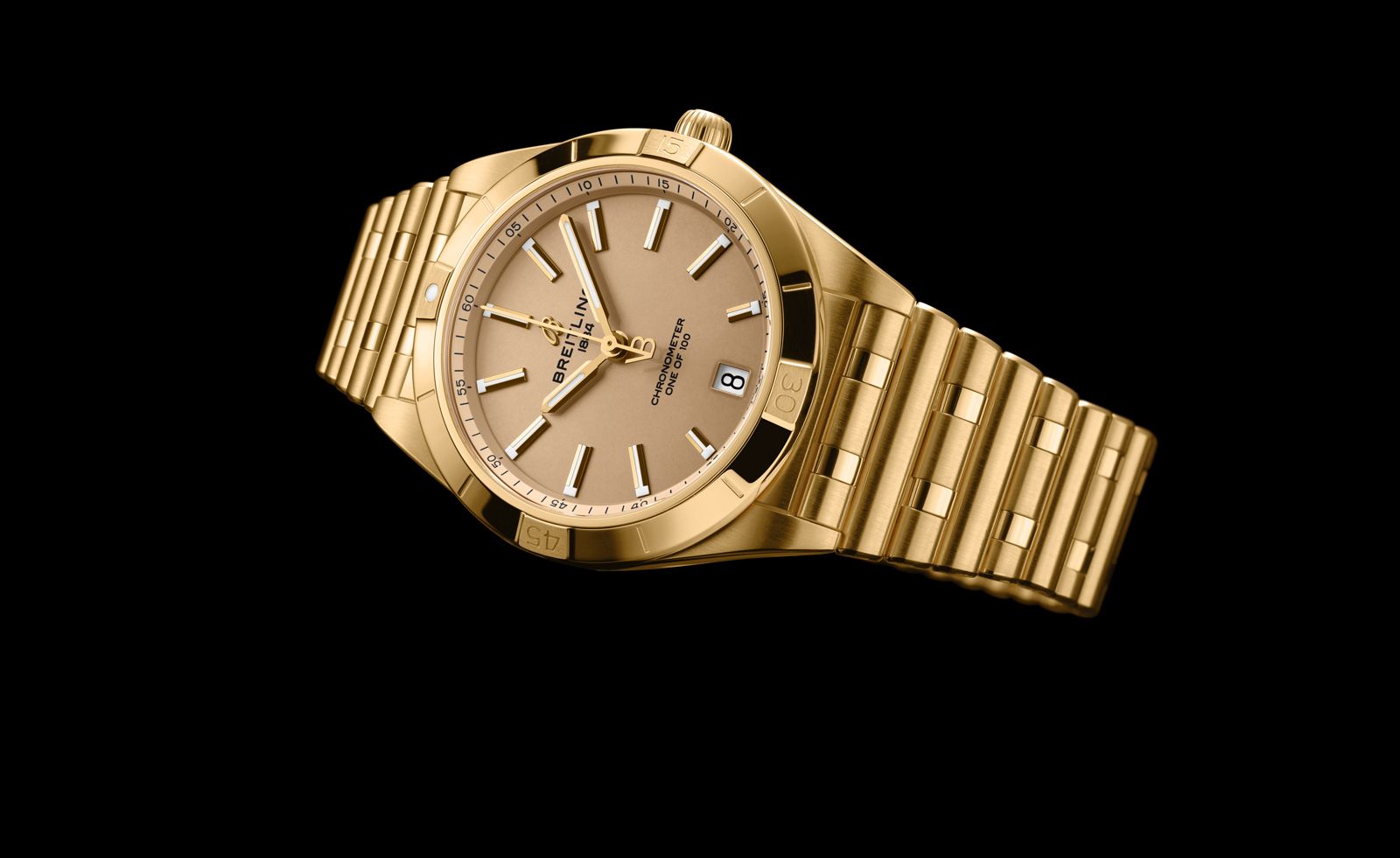 Victoria Beckham and Breitling watch in gold