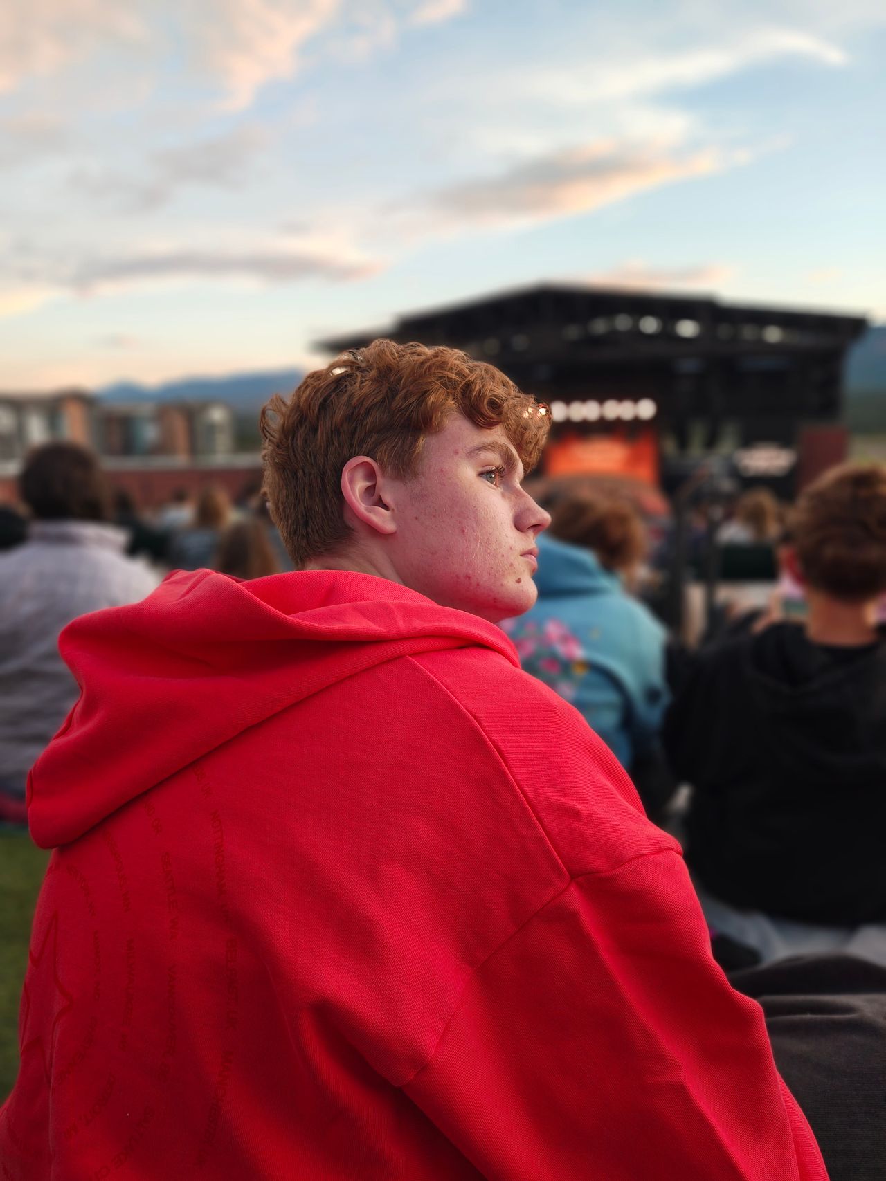 Portrait photos of a family at a restaurant and outdoor concert
