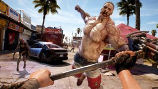 Dead Island 2 screenshot with hammer and massive zombie