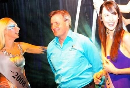 Mike Turtur, the event's race director, is brought onto the stage.