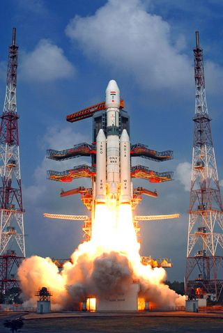 The Indian Space Research Organisation's first Geosynchronous Satellite Launch Vehicle Mark III rocket, the country's most powerful booster yet, launches on its maiden flight on Dec. 18, 2014 carrying a prototype crew capsule.