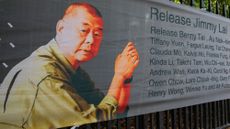 Poster of Jimmy Lai with the words "release jimmy lai" and multiple signatories