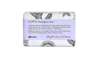 A Davines Love shampoo bar in its original packaging