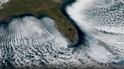 An orbital view of the Florida coast outlined by strange cloud formations.