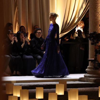a model walks in the giorgio armani ss26 show