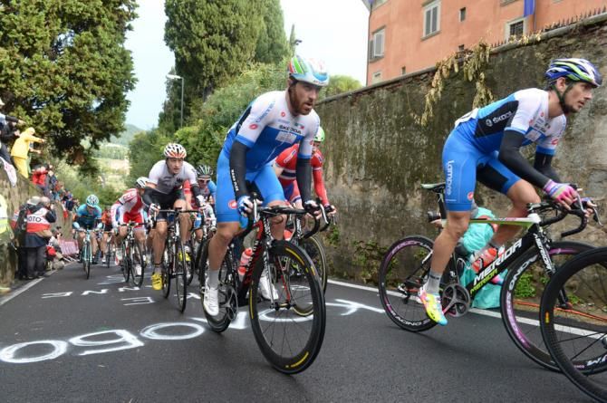 Italy's Luca Paolini and Filippo Pozzato in action during the elite men's road race world championship in Florence