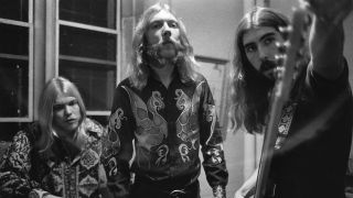 Greg Allman (background) and Berry Oakley backstage before the Allman Brothers' performance at the Sitar on October 17, 1970 in Spartanburg, South Carolina