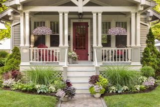 hanging baskets on a front porch