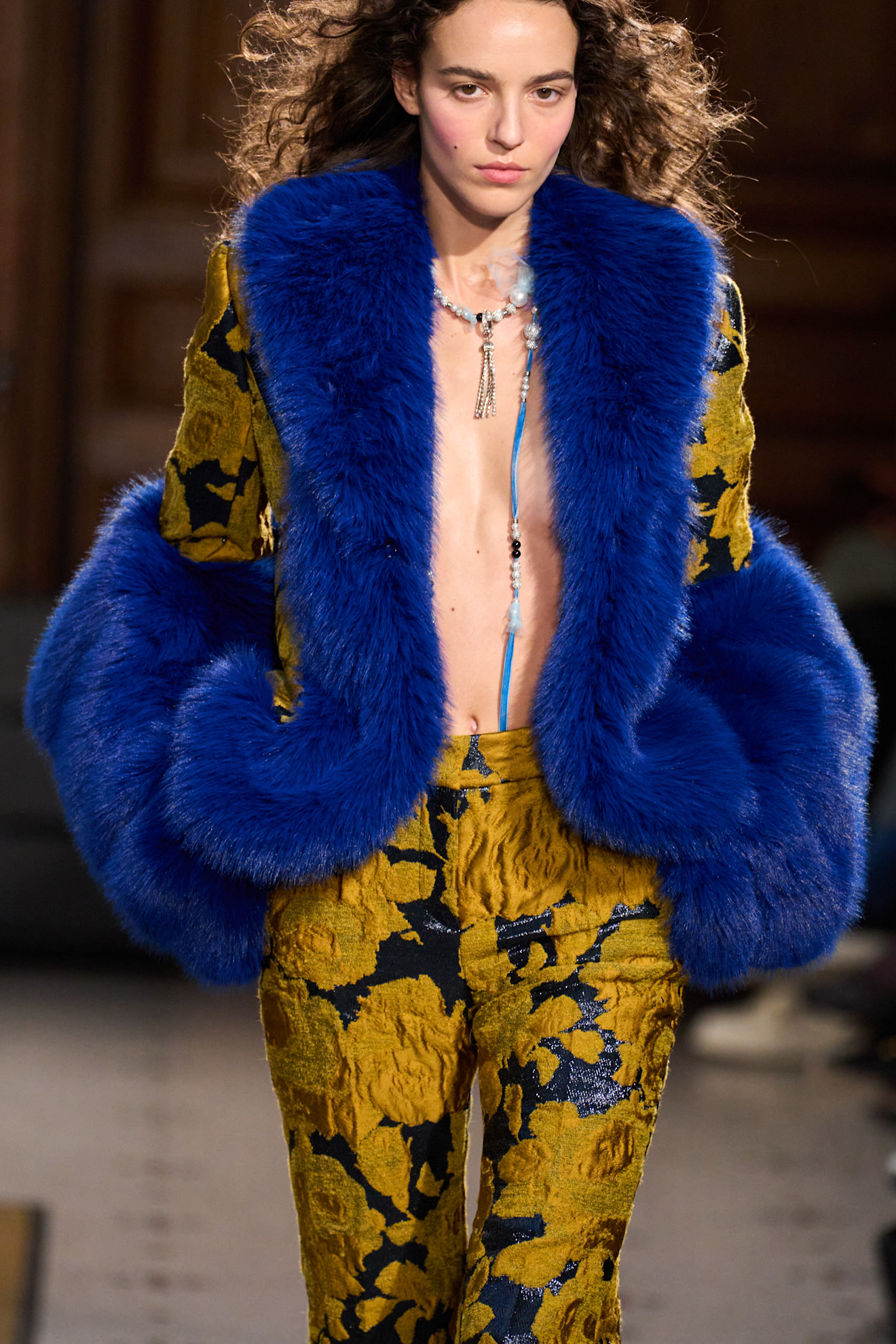 A model wore the mustard yellow color trend on the Nina Ricci Fall 2026 runway