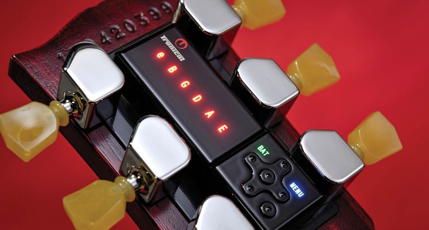 A close-up of a Gibson headstock installed with Robot Tuners