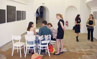 reviewing of art portfolio at villa